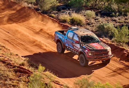 Raptor on dirt path